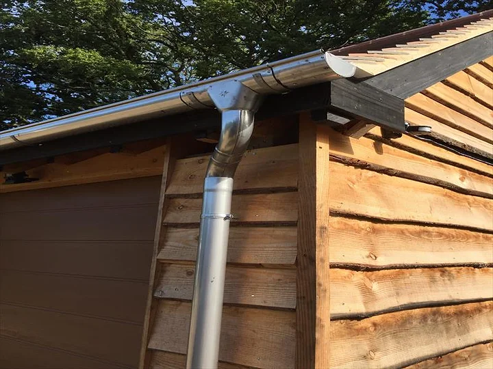 Newline new guttering and downpipe