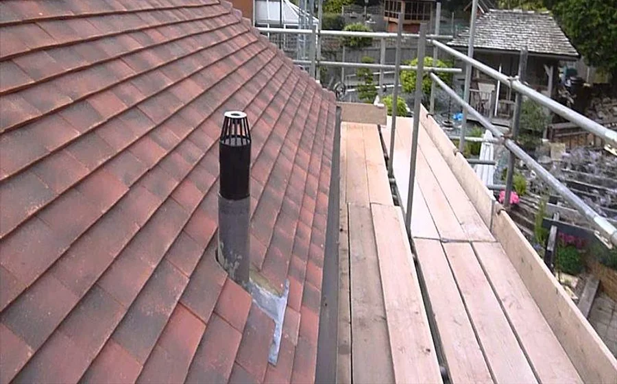 A genuine Newline roof repair — retiled pitched roof with scaffolding
